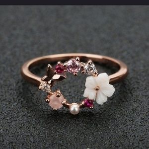 RG UNIQUE BUTTERFLY& WHITE FLOWER RING
